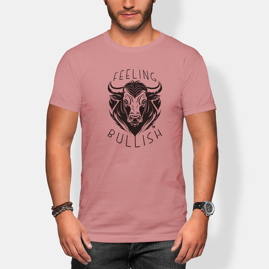 Person wearing a pink t-shirt with a bull graphic and 'Feeling Bullish' text on a white background