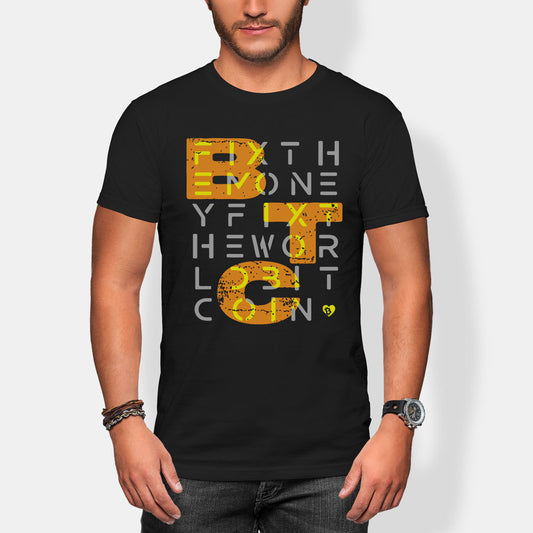 Person wearing a black t-shirt with yellow and white fix the money fix the world btc text design on a plain background