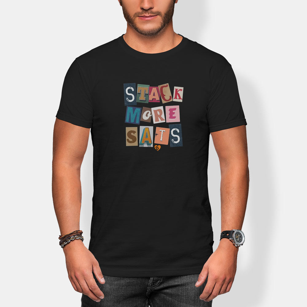Person wearing a black t-shirt with colorful text design 'stack more sats' on a white background