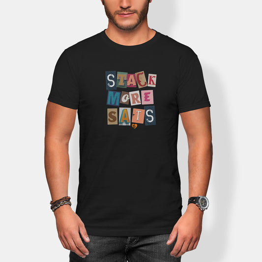 Person wearing a black t-shirt with colorful text design 'stack more sats' on a white background