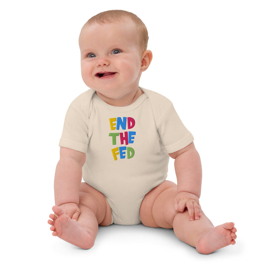Baby wearing a onesie with 'END THE FED' text on a white background