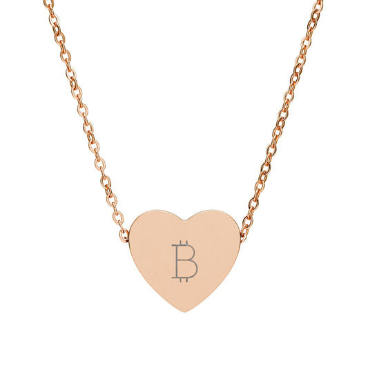 Rose gold necklace with a heart-shaped pendant featuring the Bitcoin symbol on a white background