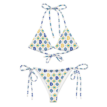 Two-piece swimsuit with geometric bitcoin pattern on a white background