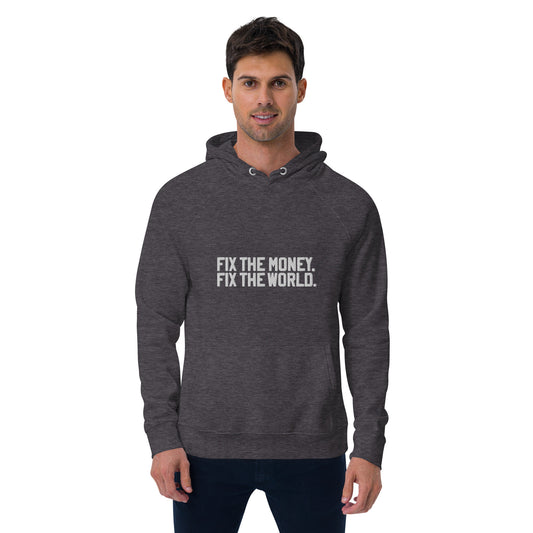 Man wearing a dark gray hoodie with 'Fix The Money, Fix The World' text on a white background