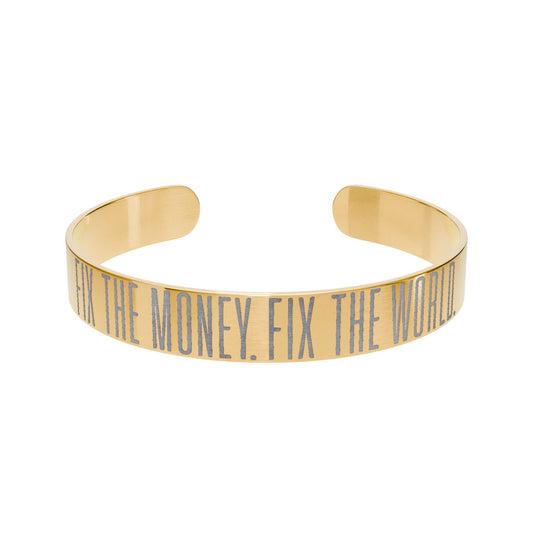 Gold bracelet with engraved fix the money fix the world text on a white background