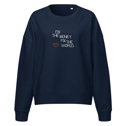 Navy blue sweatshirt with fix the money. fix the world. text and heart design on a white background