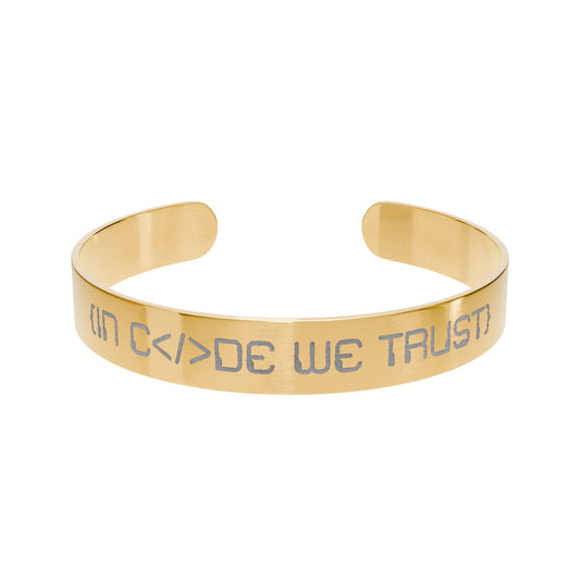 Gold bracelet with 'IN CODE WE TRUST' engraving on a white background