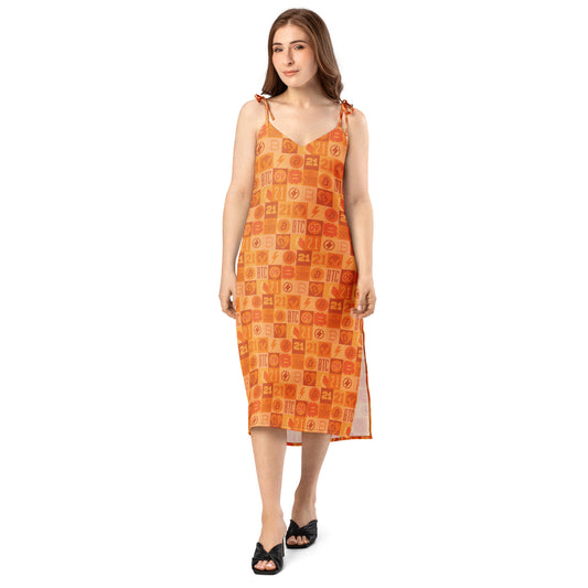 Woman wearing an orange bitcoin patterned dress on a white background