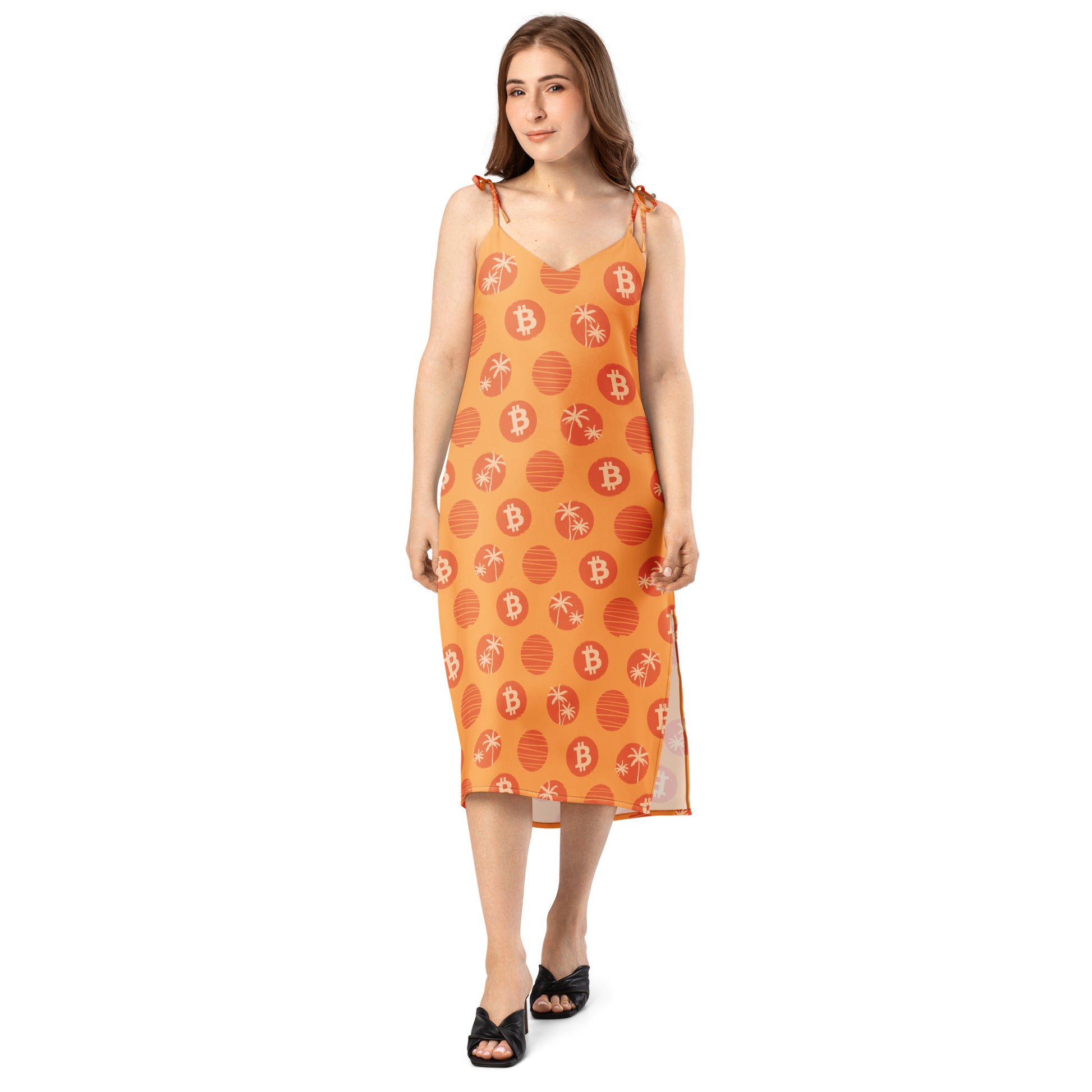 Woman wearing an orange dress with tropical bitcoin patterns and text on a white background