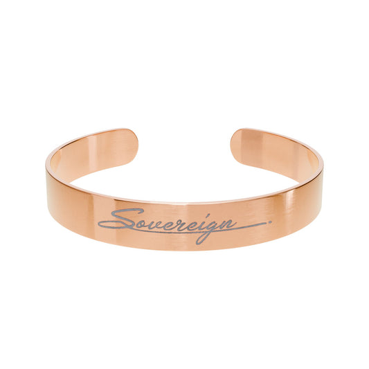 Rose gold bracelet with 'Sovereign' engraving on a white background