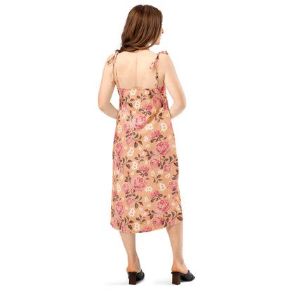 Woman wearing a floral bitcoin dress on a white background