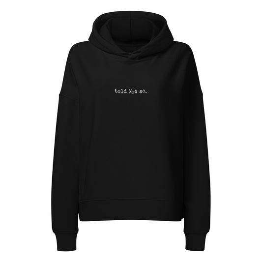 Black hoodie with 'told you so' text on a white background