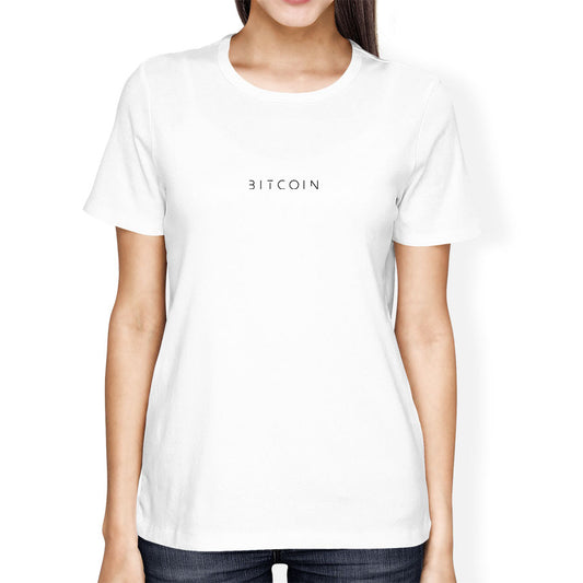 Person wearing a white t-shirt with 'BITCOIN' printed on it.