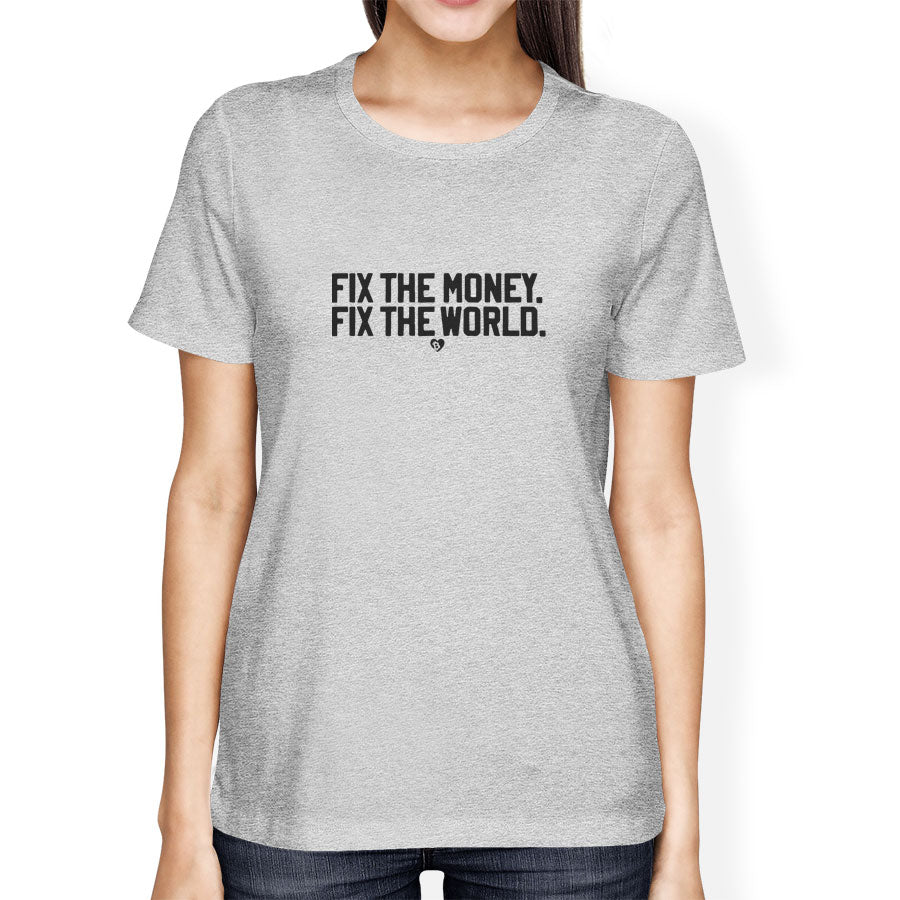 Person wearing a gray t-shirt with 'FIX THE MONEY, FIX THE WORLD.' text on a white background