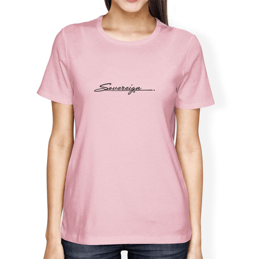 Person wearing a pink t-shirt with 'Sovereign' printed on it against a white background